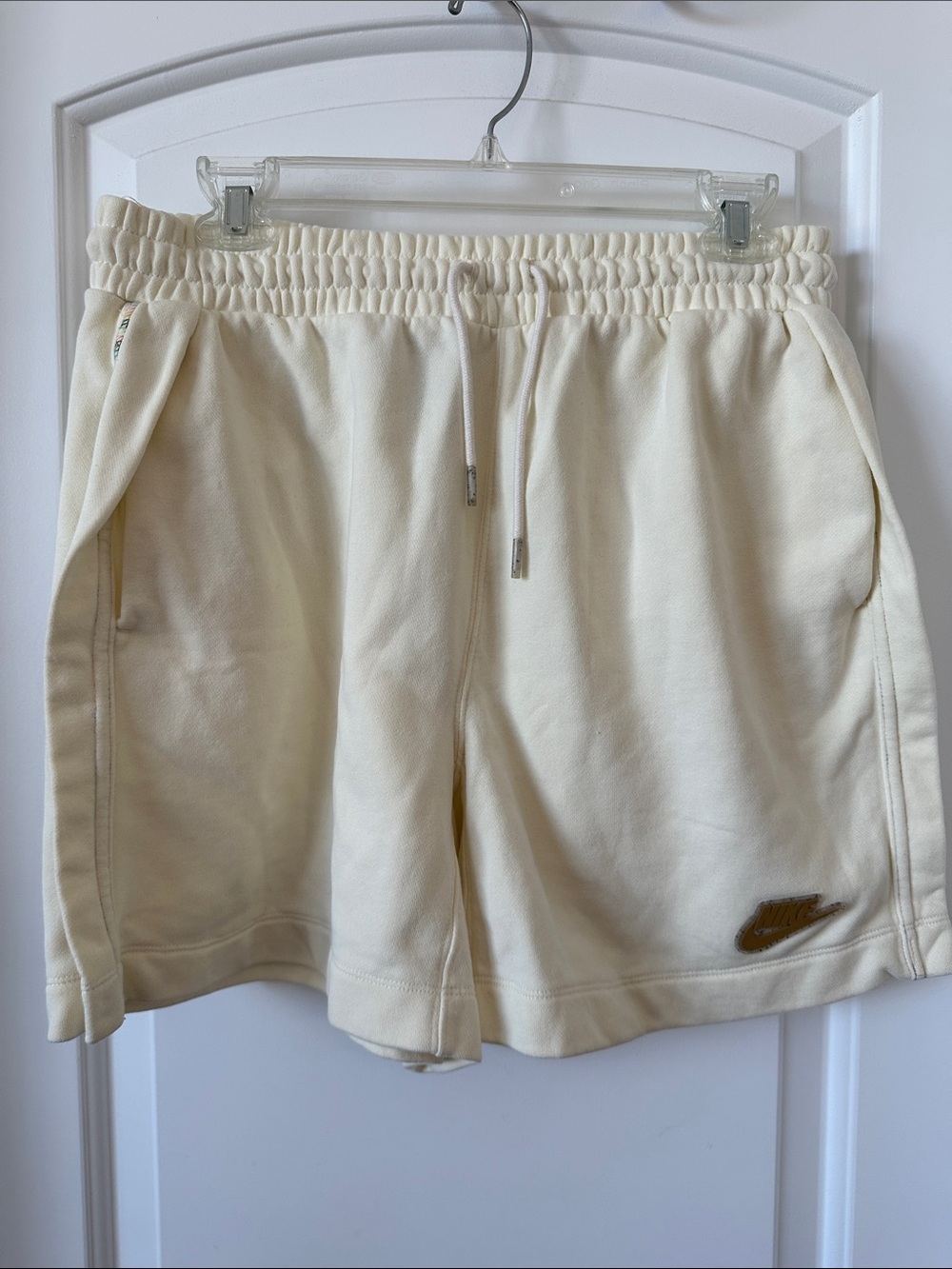 Nike Cream Athletic Fleece Shorts with Gold Swoosh